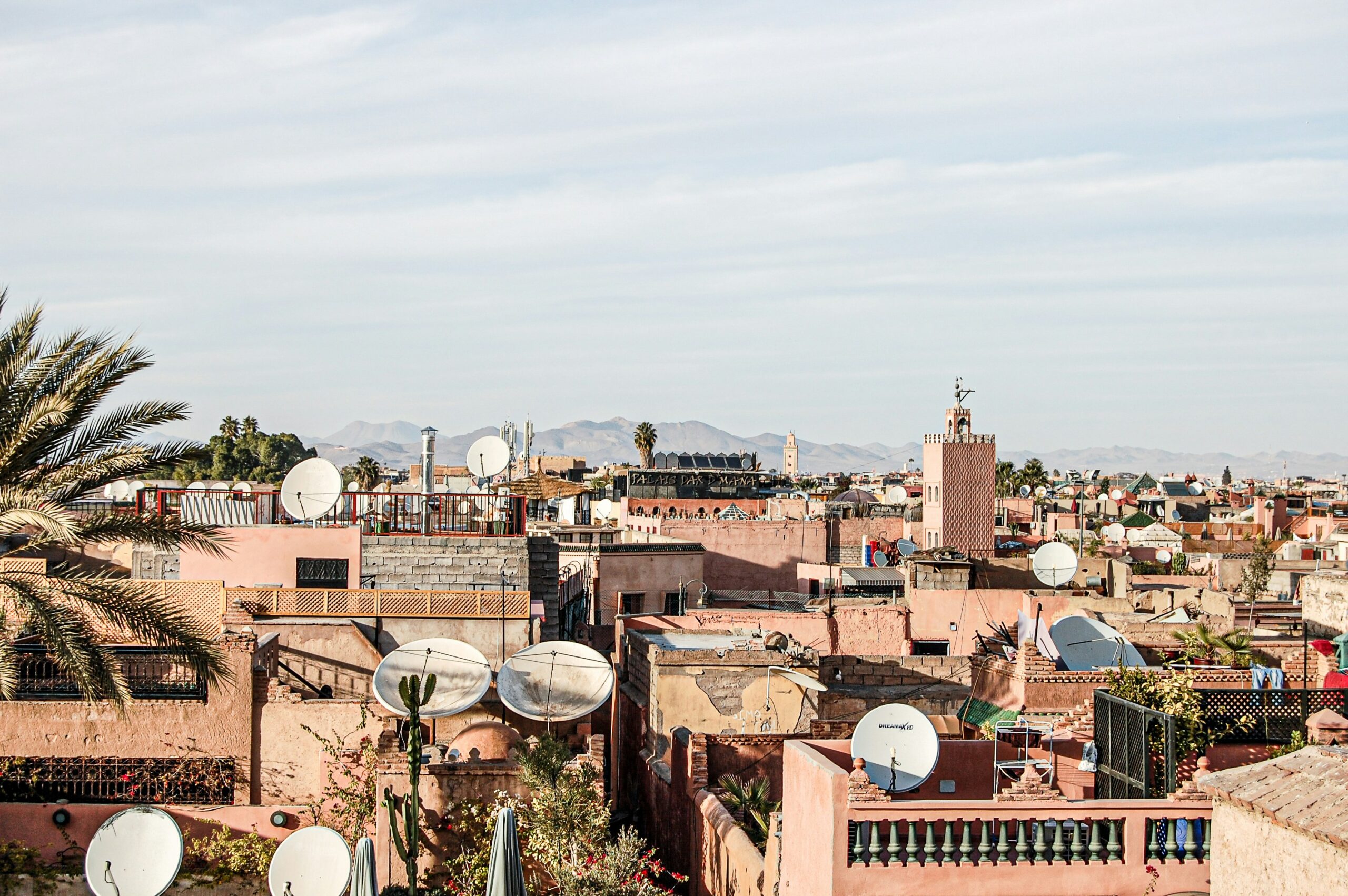 Skyline of Marrakech with rooftops and the Atlas Mountains in the background