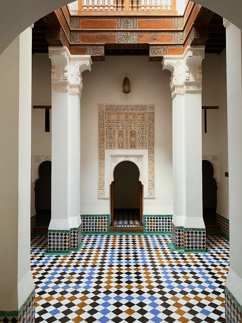 Traditional Moroccan palace courtyard with mosaic tiles
