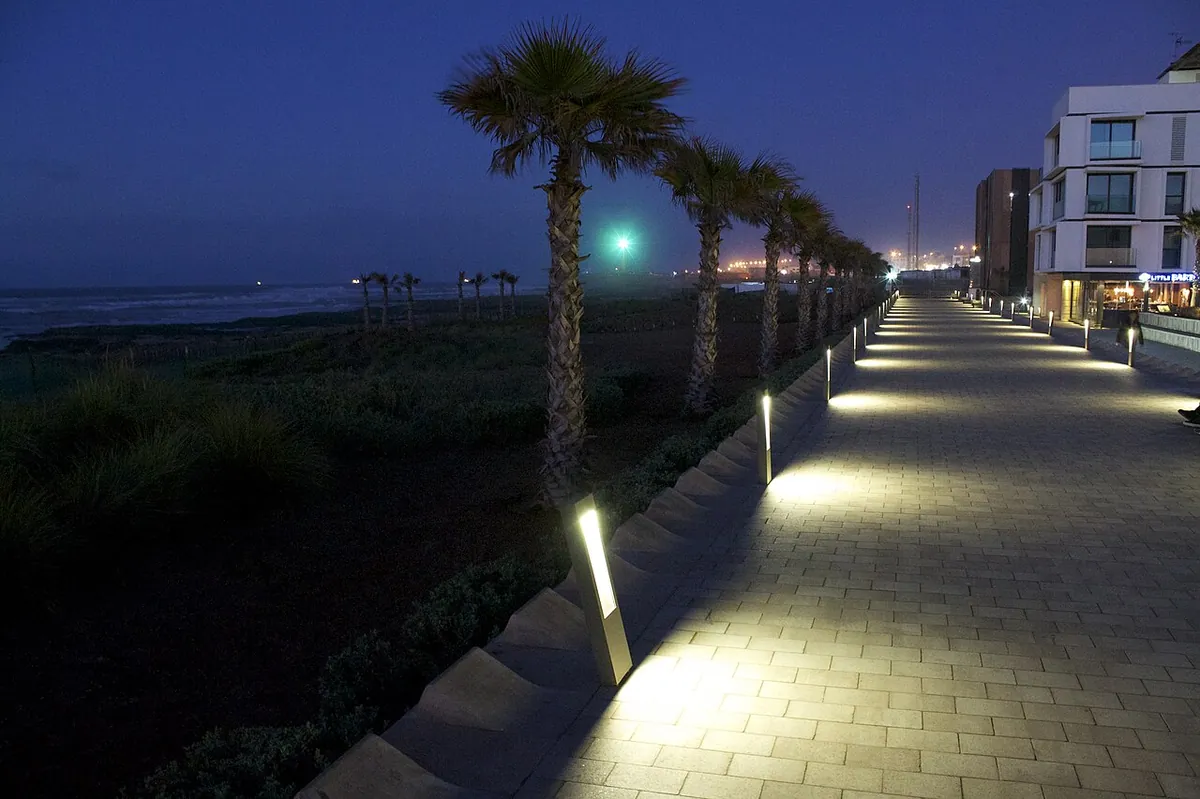 Casablanca Travel Guide: The Honest Handbook (2026) 6 Casablanca skyline at night with the illuminated Hassan II Mosque in the foreground